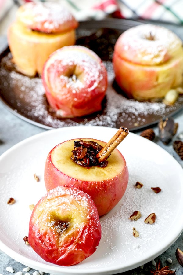 French Stuffed Baked Apples - A delicious dessert that hails from the French country side, these stuffed baked apples are sweet, tender and stuffed with nutritious ingredients. They are scrumptious! #dessertrecipes #christmasrecipes #vegetariandessert #healthydessert | pickledplum.com