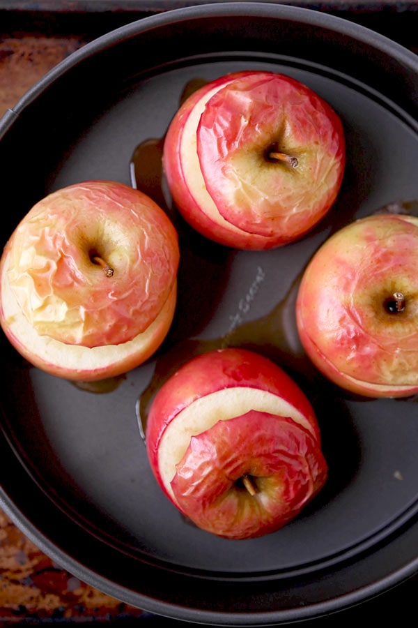 French Stuffed Baked Apples - A delicious dessert that hails from the French country side, these stuffed baked apples are sweet, tender and stuffed with nutritious ingredients. They are scrumptious! #dessertrecipes #christmasrecipes #vegetariandessert #healthydessert | pickledplum.com