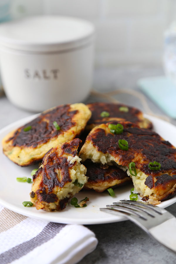 Mashed potato cakes - Are you ready to dig in to the fluffiest Mashed Potato Cakes Recipe? The perfect use for leftover mashed potatoes and ready in 17 minutes from start to finish! #potatorecipe #leftovers #mashedpotatoes | pickledplum.com