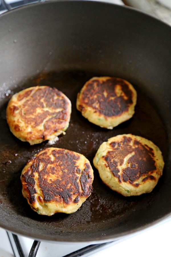 Mashed potato cakes - Are you ready to dig in to the fluffiest Mashed Potato Cakes Recipe? The perfect use for leftover mashed potatoes and ready in 17 minutes from start to finish! #potatorecipe #leftovers #mashedpotatoes | pickledplum.com