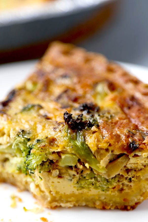 Making quiche at home is easier than you’d think! All you need is an oven and 7 ingredients to make this fluffy and savory Parmesan And Broccoli Quiche Recipe. Ready, set, bake! #frenchrecipe #homemadepie #healthybroccoliquiche | pickledplum.com