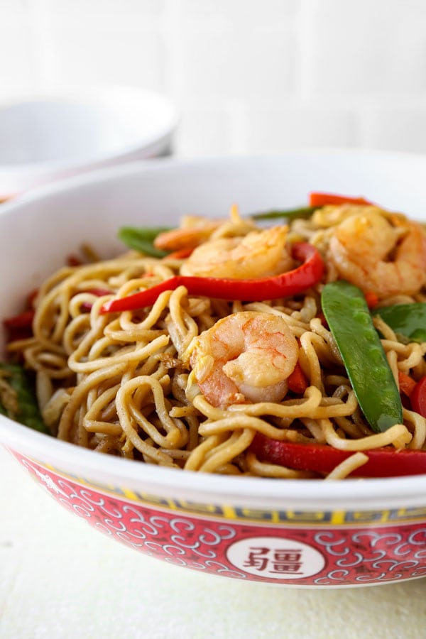 Shrimp lo mein is an easy Chinese recipe anyone can make at home! Use cabbage and your favorite veggies and stir fry them with egg noodles and an authentic lo mein sauce. Delicious! #pfchangs #stirfry #shrimprecipe #chinesefood | pickledplum.com