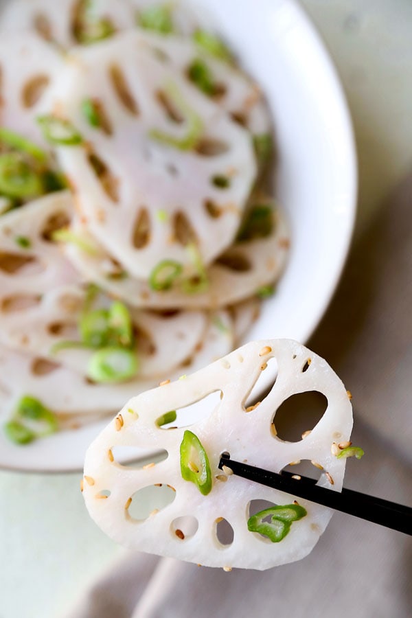 Chinese Lotus Root Salad - What a looker! Not only is this bright and cleansing Chinese Lotus Root Salad packed with goodness, it’s a beautiful addition to the dinner table. Ready in 15 minutes! #recipe #lotusroot #benefits #veganrecipes #vegetarianrecipes #veganchinese #sidedish | pickledplum.com