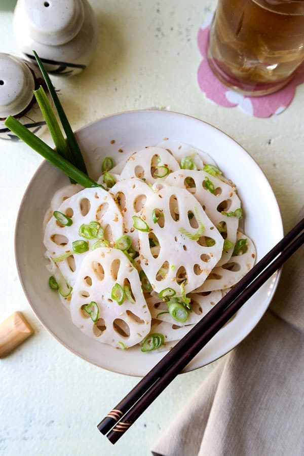 Chinese Lotus Root Salad - What a looker! Not only is this bright and cleansing Chinese Lotus Root Salad packed with goodness, it’s a beautiful addition to the dinner table. Ready in 15 minutes! #recipe #lotusroot #benefits #veganrecipes #vegetarianrecipes #veganchinese #sidedish | pickledplum.com