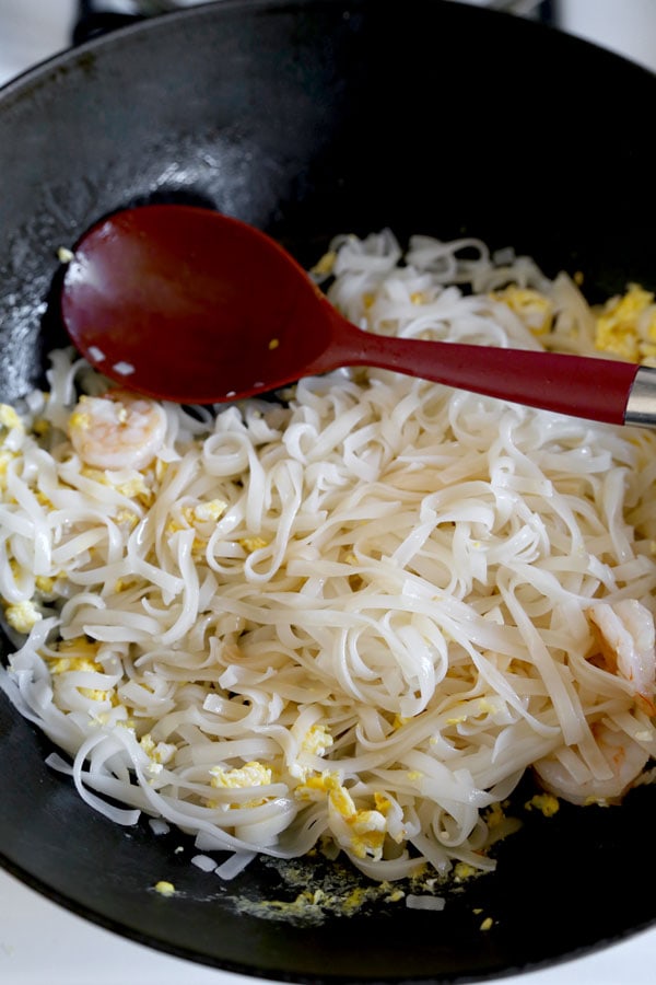 Classic Pad Thai - Ready for some stir fried noodle action? This Classic Pad Thai Recipe is a taste of Thailand. Best part: you can make these Thai noodles at home in 21 minutes! #thaifood #stirfry #asianrecipe #padthai | pickledplum.com