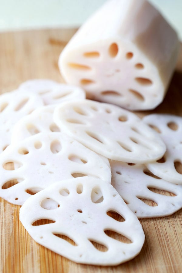 Chinese Lotus Root Salad - What a looker! Not only is this bright and cleansing Chinese Lotus Root Salad packed with goodness, it’s a beautiful addition to the dinner table. Ready in 15 minutes! #recipe #lotusroot #benefits #veganrecipes #vegetarianrecipes #veganchinese #sidedish | pickledplum.com