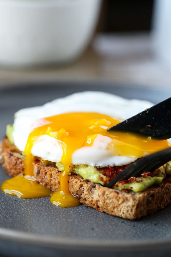 Avocado toast with egg - This is a delicious vegan recipe for a smoky avocado toast with miso. Add an egg on top for a more substantial breakfast or lunch! #avocadotoast #breakfast #healthyrecipes #veganrecipe | pickledplum.com