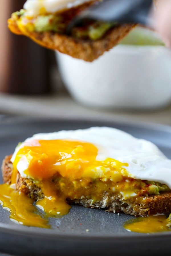 Avocado toast with egg - This is a delicious vegan recipe for a smoky avocado toast with miso. Add an egg on top for a more substantial breakfast or lunch! #avocadotoast #breakfast #healthyrecipes #veganrecipe | pickledplum.com