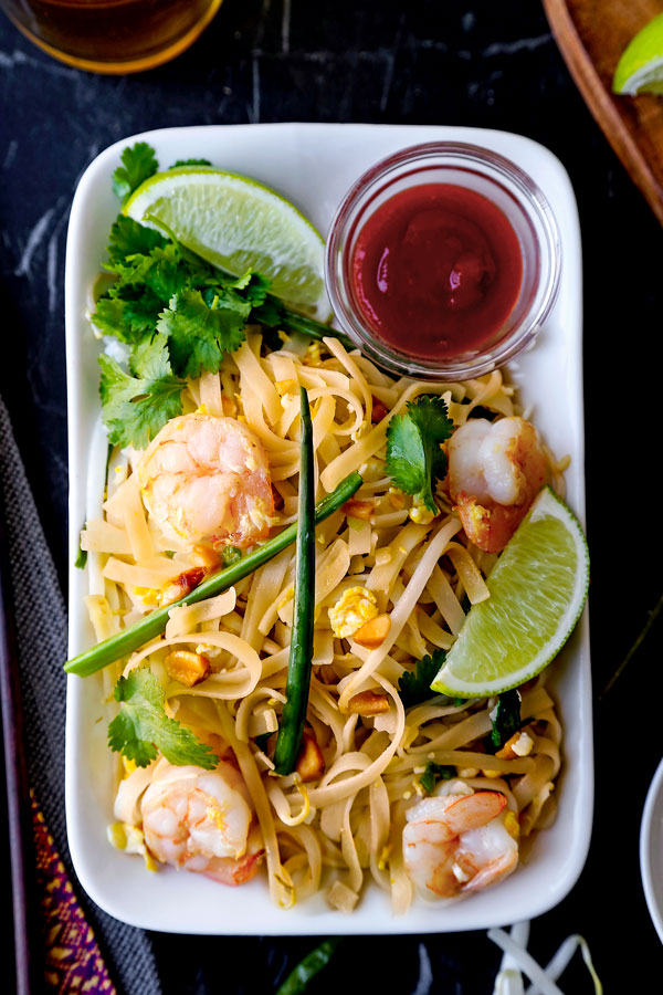 Classic Pad Thai - Ready for some stir fried noodle action? This Classic Pad Thai Recipe is a taste of Thailand. Best part: you can make these Thai noodles at home in 21 minutes! #thaifood #stirfry #asianrecipe #padthai | pickledplum.com