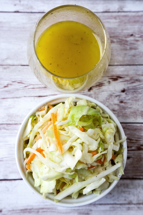 Coleslaw Dressing - Four easy and delicious homemade coleslaw dressing recipes. Vinegar, creamy, no mayo, Asian, with Greek yogurt, apple cider, there is one that's just right for you! #coleslaw #dressingrecipe #pioneerwoman #saladdressing #cabbage #slaw #vegan #nomayo #sidedish | pickledplum.com