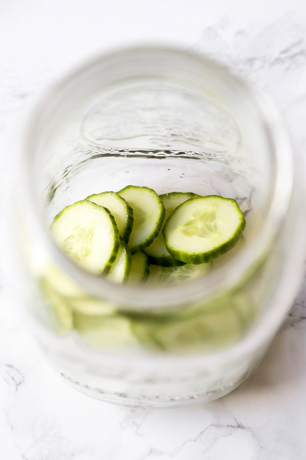 Sliced cucumber in jar