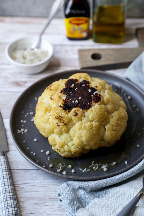 Whole Roasted Cauliflower Head - My favorite cauliflower recipe of all time! With only 3 ingredients needed and 5 minutes of prepping, little effort is required to making this dish - and it always gets the seal of approval! #veganrecipe #vegetarianrecipes #glutenfreerecipes #veggies #bakedcauliflower #keto | pickledplum.com