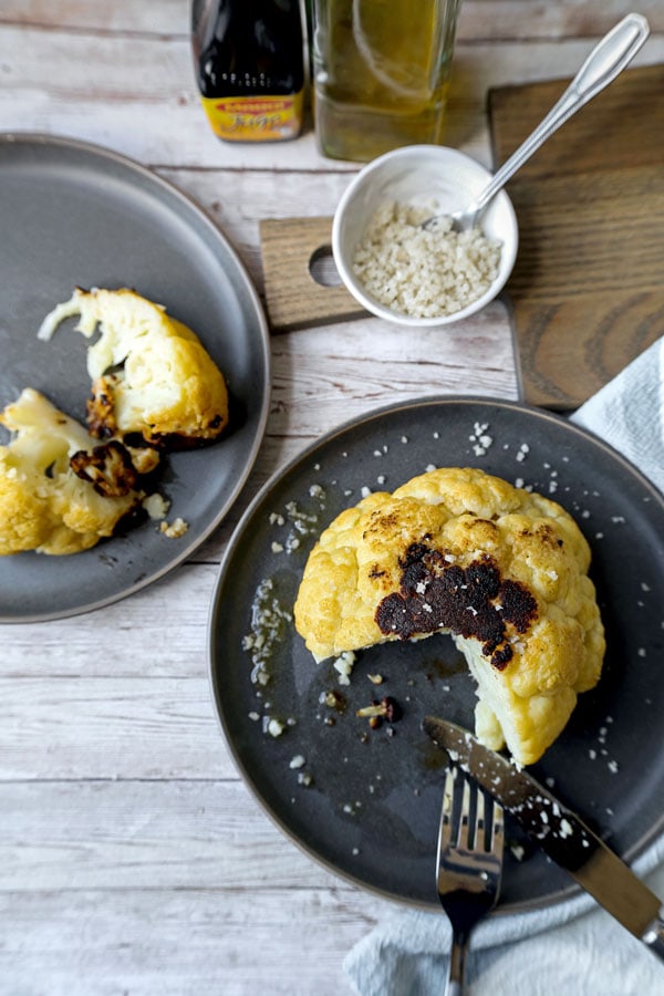 Whole Roasted Cauliflower Head - My favorite cauliflower recipe of all time! With only 3 ingredients needed and 5 minutes of prepping, little effort is required to making this dish - and it always gets the seal of approval! #veganrecipe #vegetarianrecipes #glutenfreerecipes #veggies #bakedcauliflower #keto | pickledplum.com