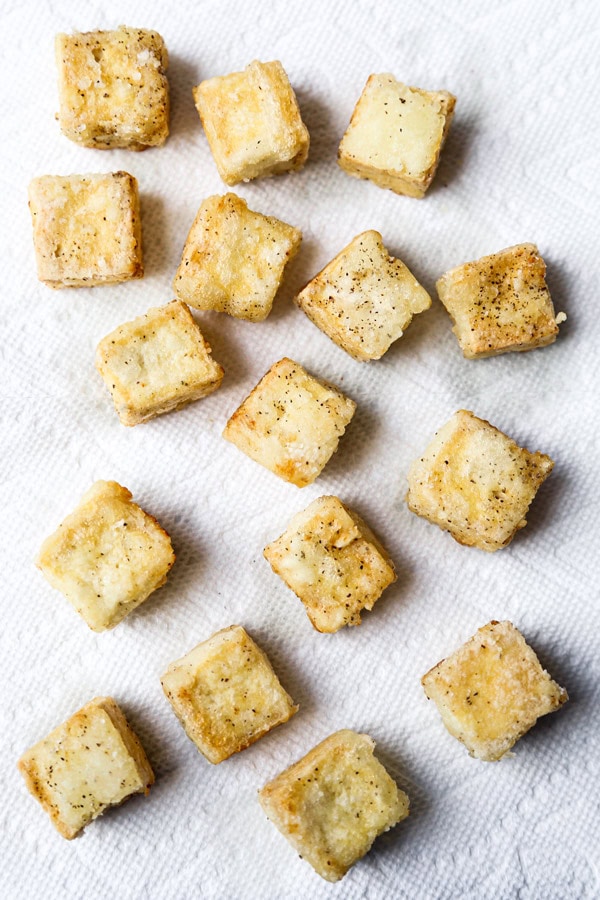 crispy tofu cubes on paper towel | pickledplum.com