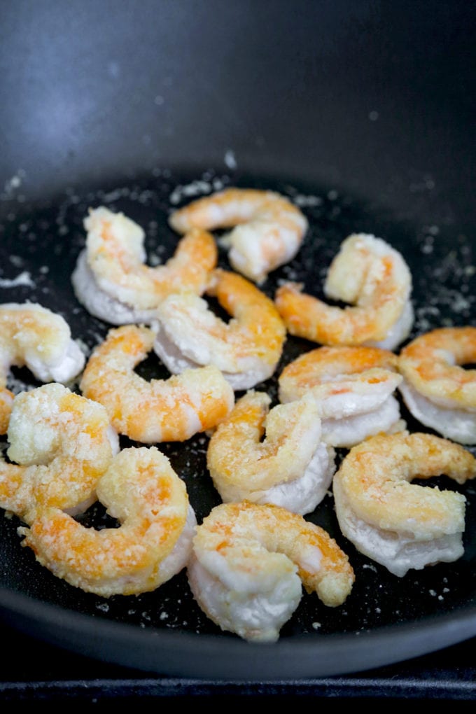 shrimp frying in a pan