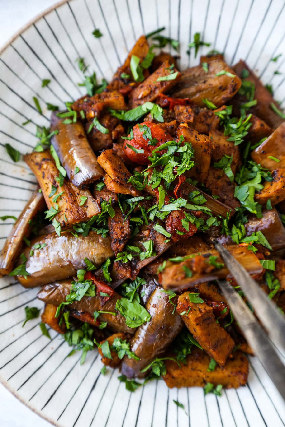 Stir fried eggplant and seitan with garlic and tomato