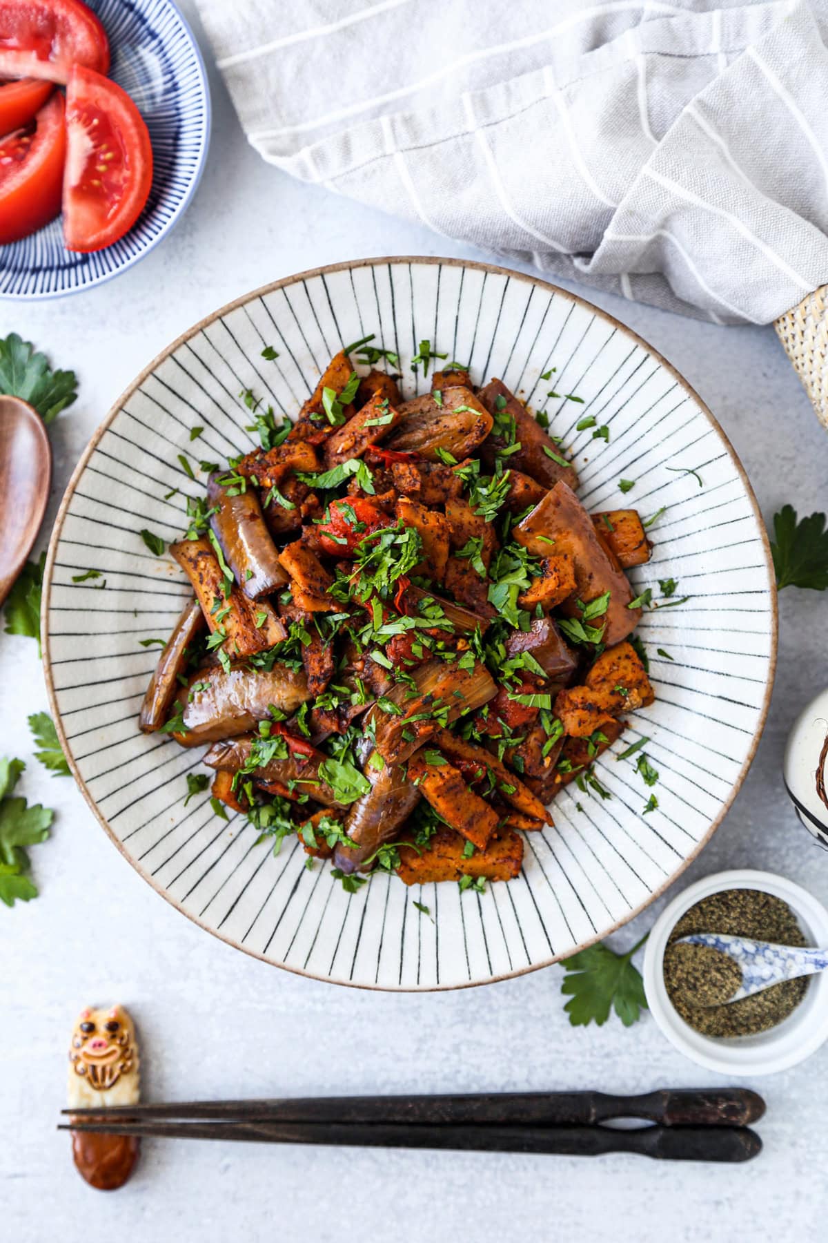 Stir fried eggplant and seitan with garlic and tomato