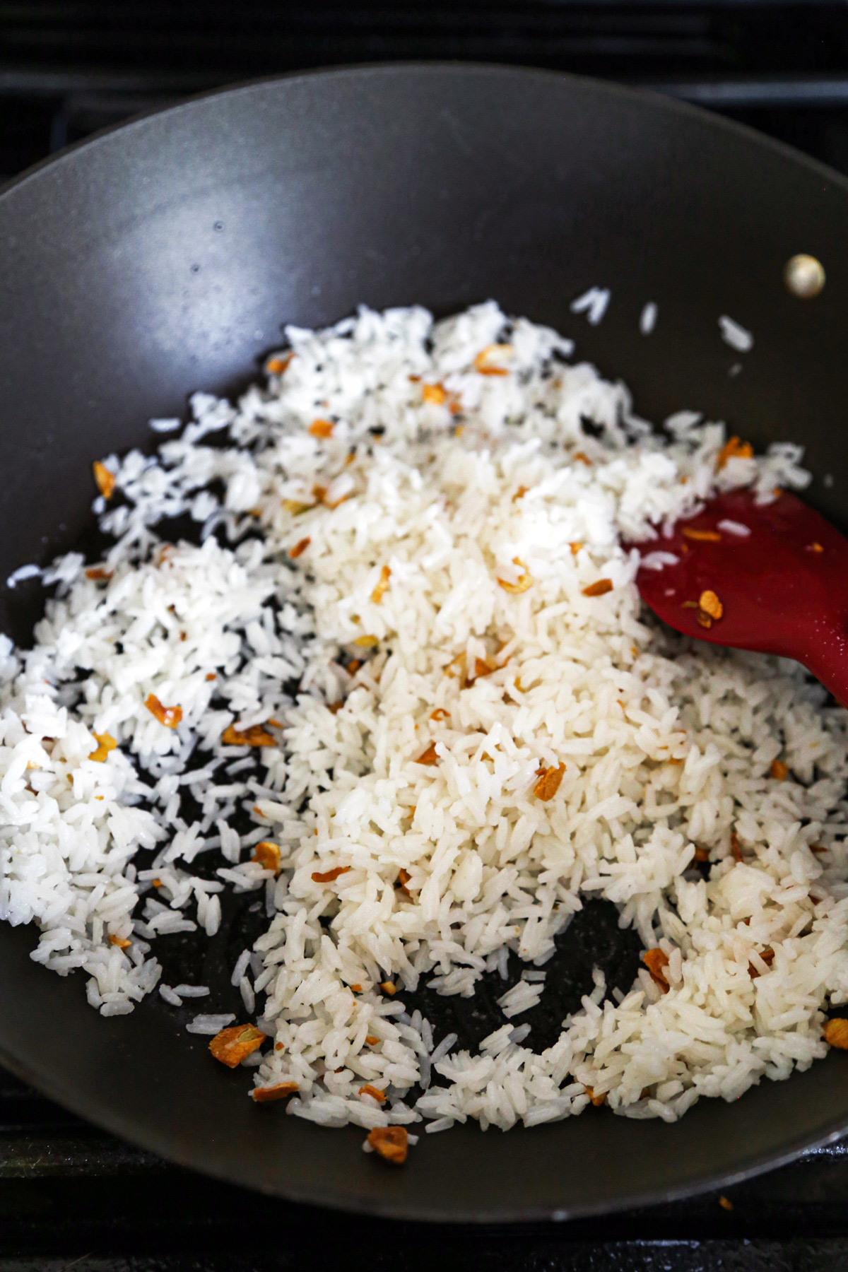 Rice and garlic in a pan