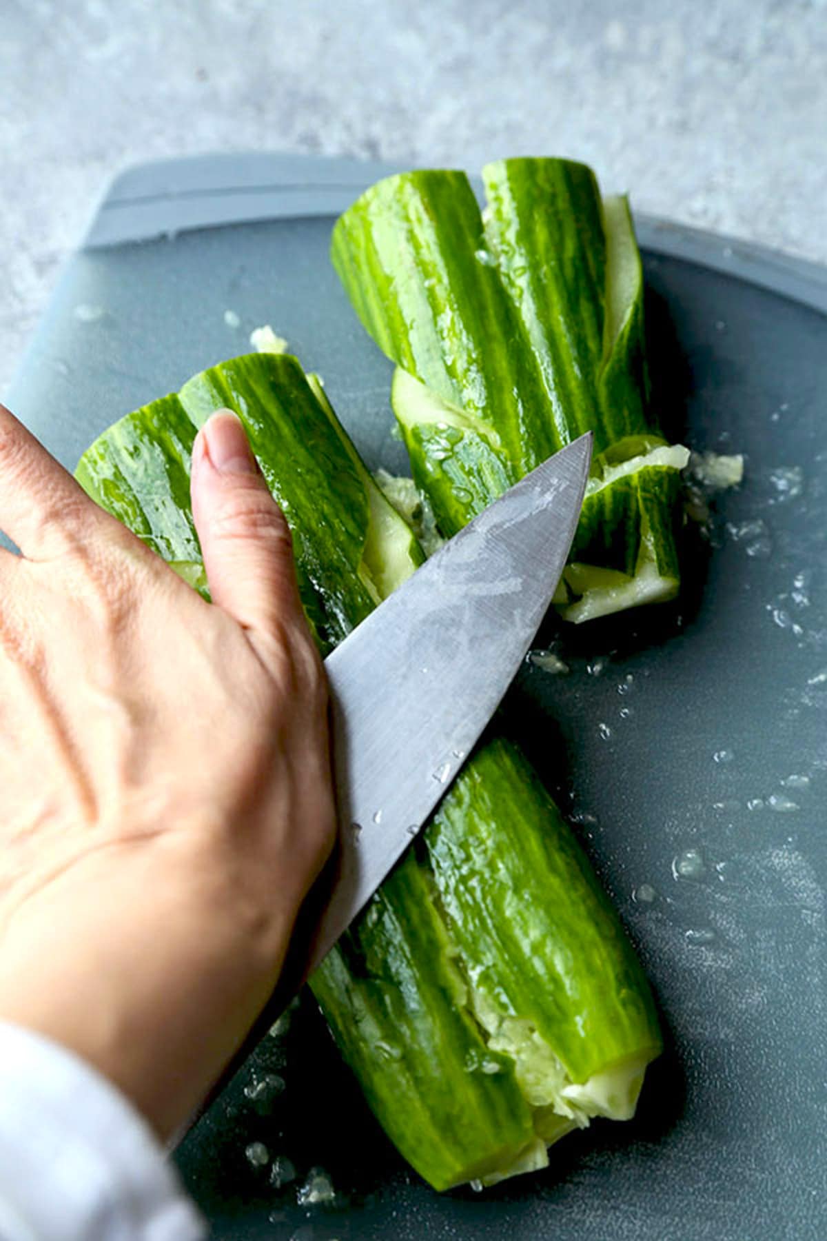 cucumber smashed with a knife