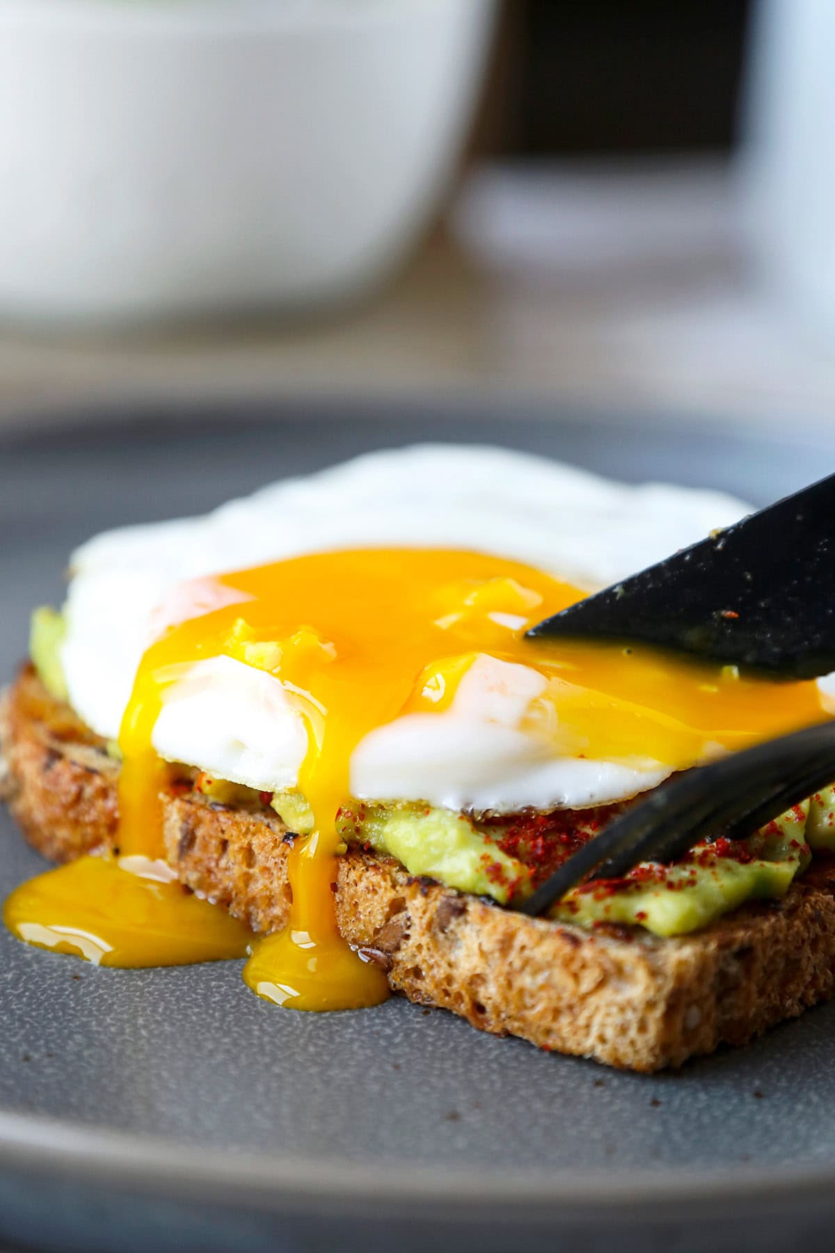 Avocado toast with runny egg