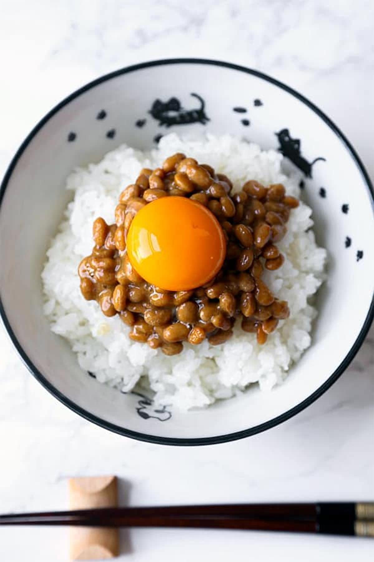 Bowl of rice with natto and raw egg