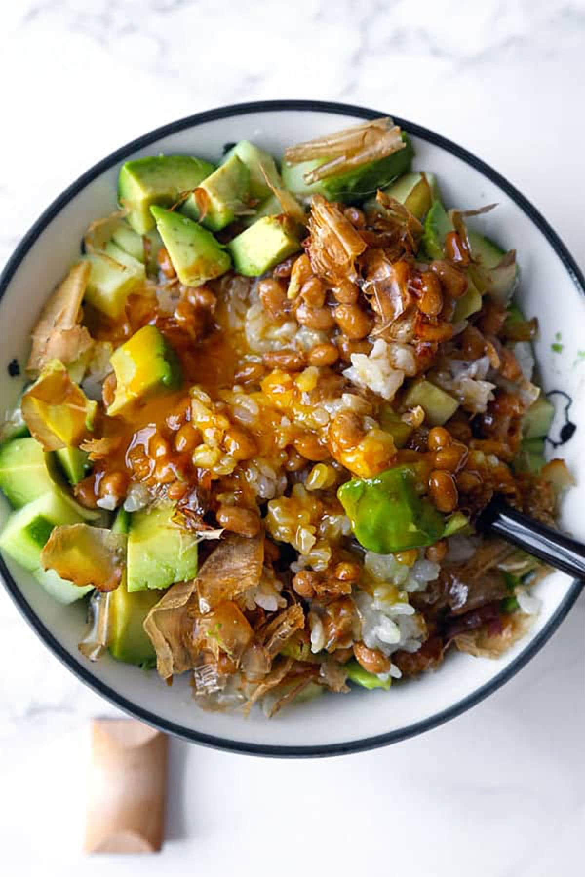 Rice with natto, avocado, egg, and bonito flakes