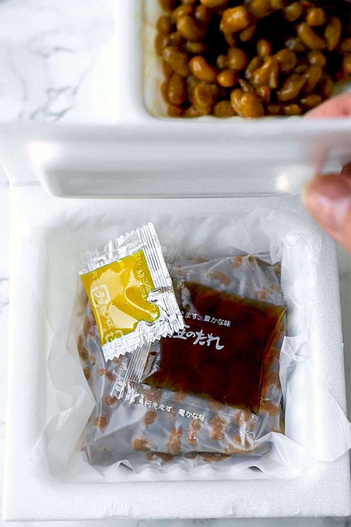 Natto in package with mustard and tare sauce