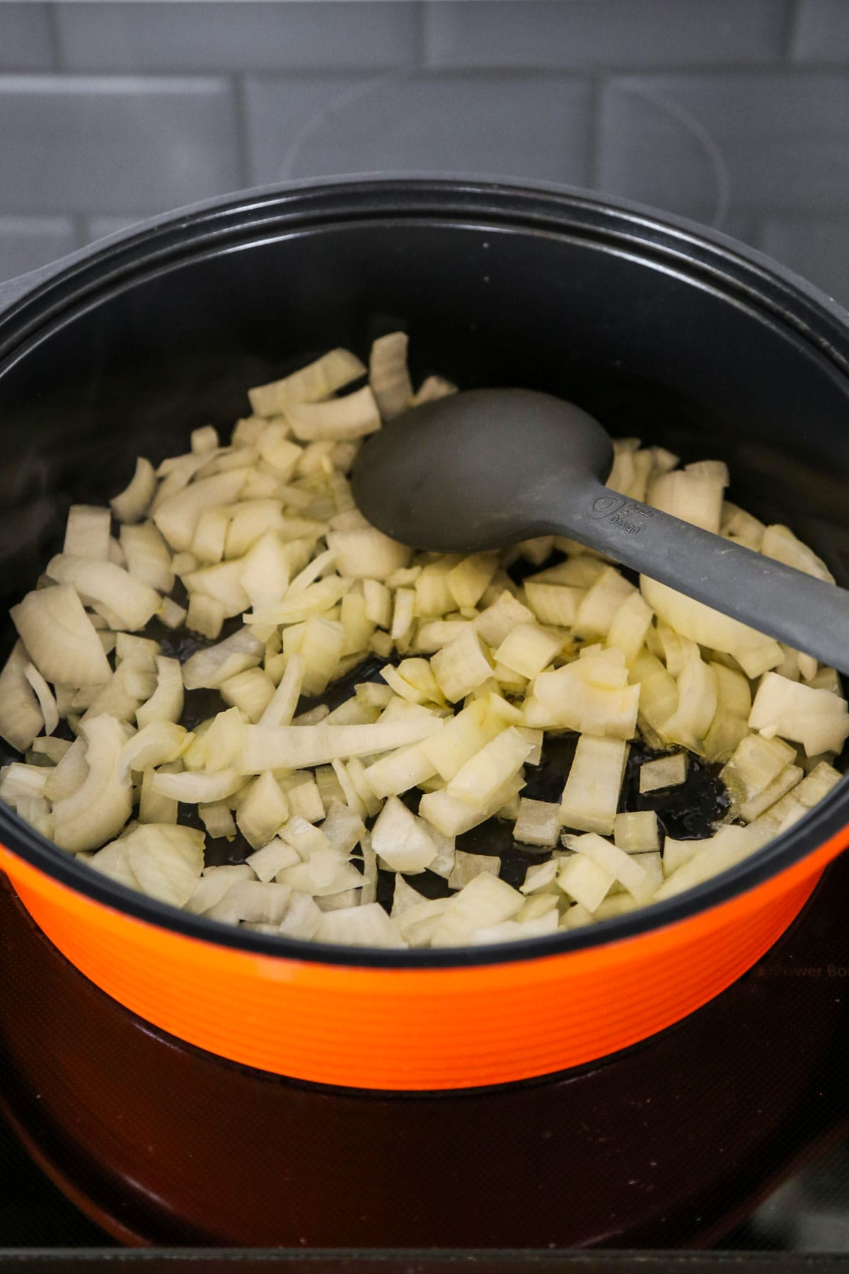 onion frying in pan