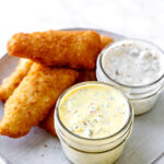fried fish with two types of tartar sauce. American tartar sauce and Japanese tartar sauce