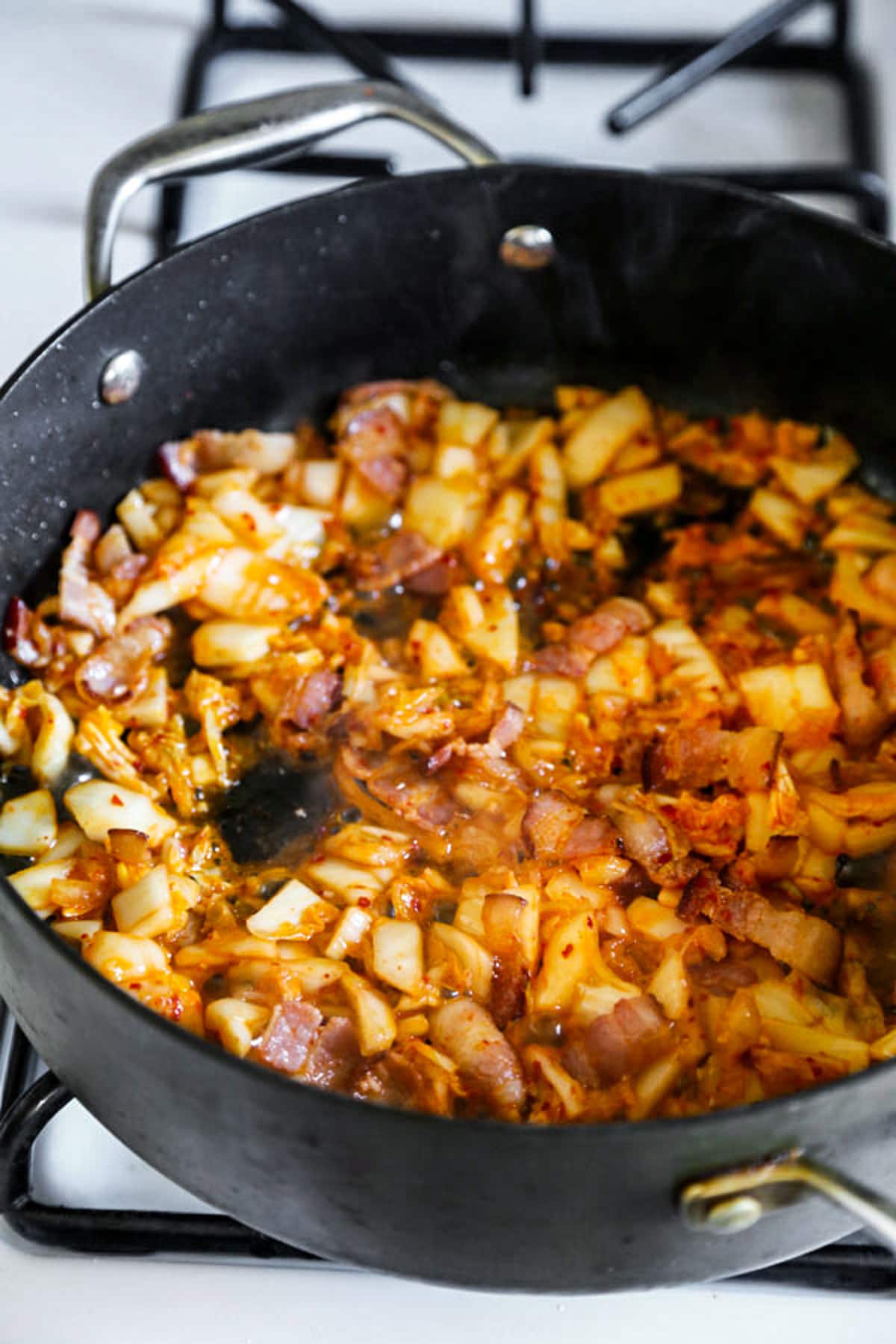 Bacon and onions in skillet