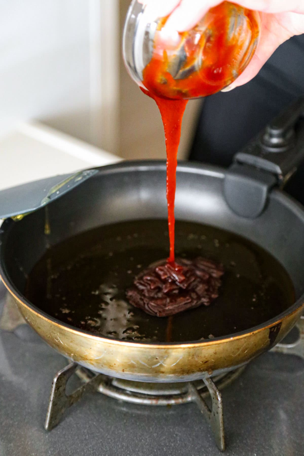 honey and gochujang in a skillet