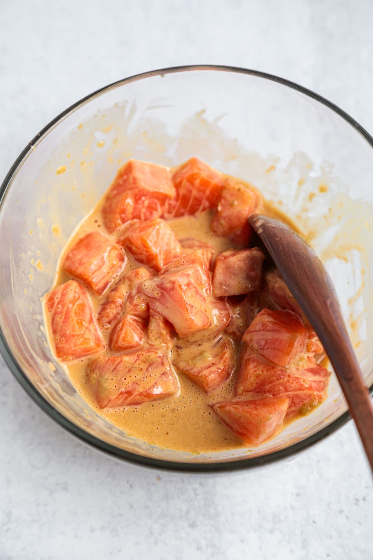 sliced salmon with dressing